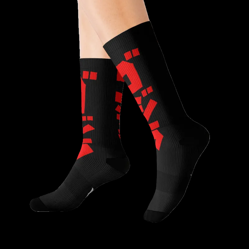 Godzilla socks worn with sneakers — bold kaiju pattern for everyday fandom style