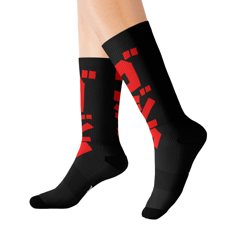 Godzilla socks worn with sneakers — bold kaiju pattern for everyday fandom style